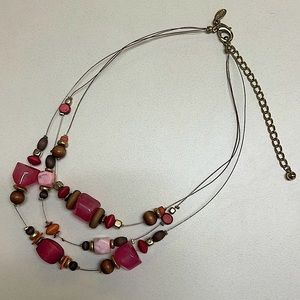 Chico’s necklace. Primarily wooden and plastic beading with metal accents.